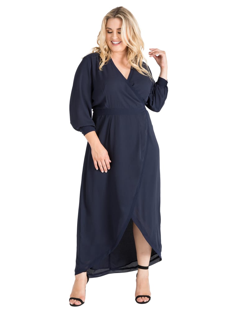 Front of a model wearing a size 2X Arya Wrap Chiffon Dress in Blue by Standards & Practices. | dia_product_style_image_id:276066